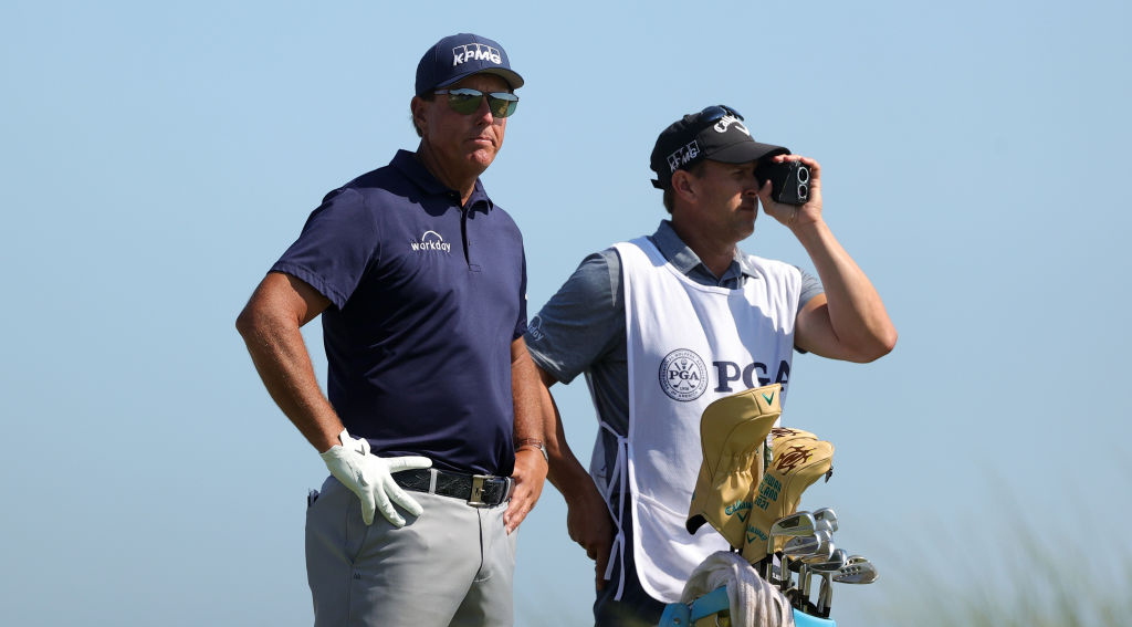 Phil Mickelson's Caddie using a Rangefinder on the PGA Tour